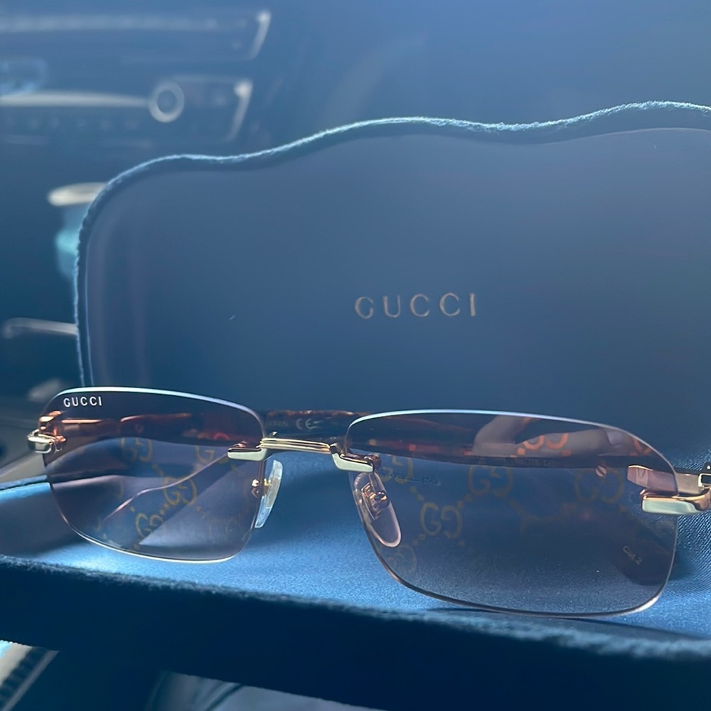 Gucci authentic sunglasses. Only worn a couple times. Brand new. Good and brown.